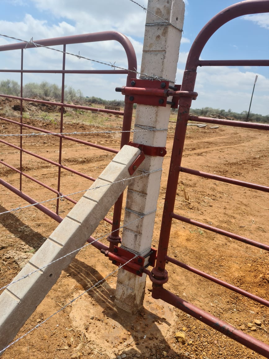 Two plastic water storage tanks in front of a residential property, supplied and installed by Deep End Plumbing.