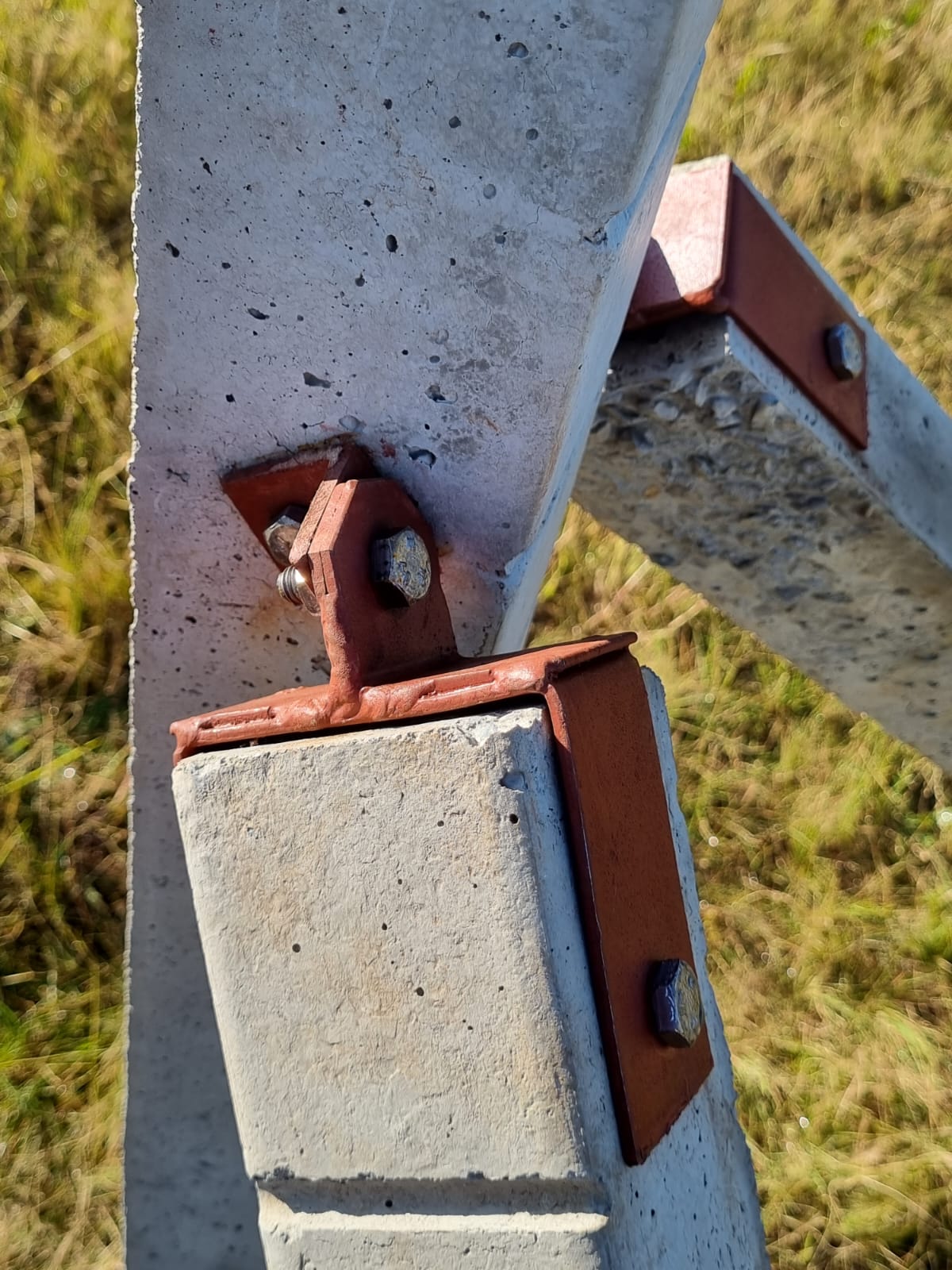 Two plastic water storage tanks in front of a residential property, supplied and installed by Deep End Plumbing.