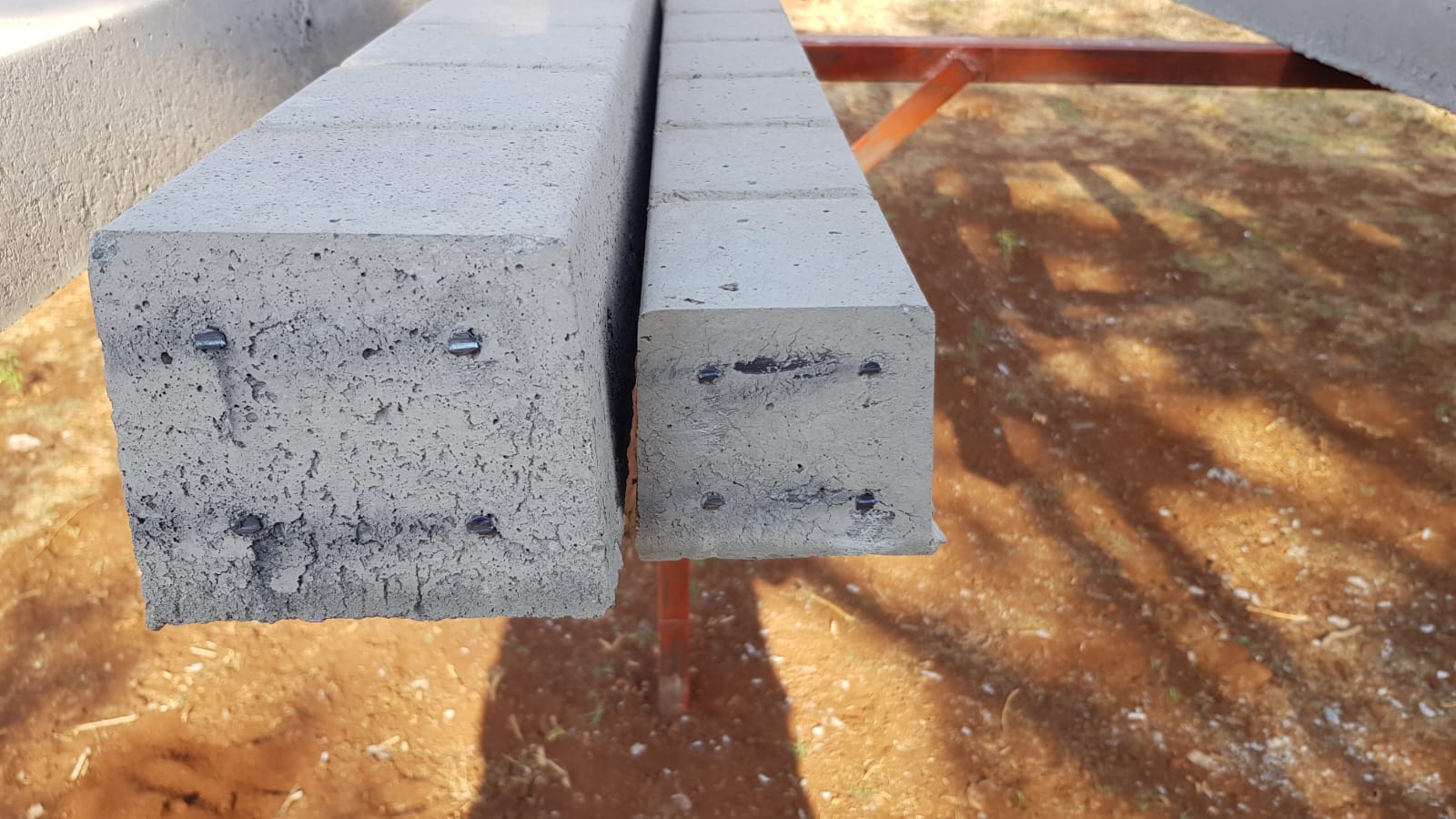 Two plastic water storage tanks in front of a residential property, supplied and installed by Deep End Plumbing.